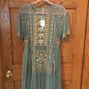 Free people nylon maxi dress. Sheer fabric with gorgeous detail.